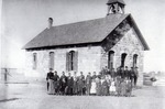 Schoolchildren in Front of the First School House