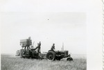 Two Men Harvesting Crew