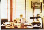 2012-1-385: Dr. Hertzler at His Desk