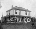 Group Photograph in Front of a House