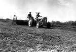 Tractor Pulling a Hay Rake