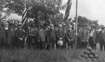 Group of Men at a Flagpole