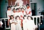 Father Oliver K. with Children at the Church Altar