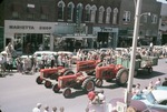 Four Tractors in a Parade