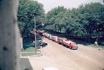 Wheat Trucks Lined Up at the Consolidated Flour Mill