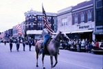 Man on Horseback and Color Guard