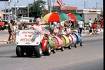 Children in a Barrel Train in a Parade