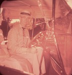 Cecil Hornbaker in an Antique Car