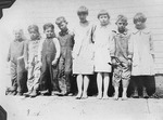 Boys and Girls In Front of a School