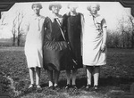 Four Girls Standing Outside
