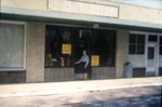 Dorothy Gingerich in Front of Her Shop