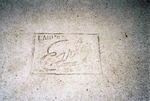 Close-up of the Stamp in a Sidewalk