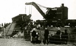 Crane Removing a Wrecked Train Car in 1922 by Linda Koppes