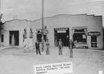 Several Men Outside a Service Station in Halstead