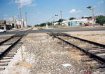 Train Tracks Leading to Main Street by L. M. Hurley