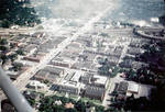 Aerial view of Business District from West Seventh to Third Streets