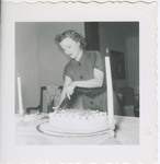 Dr. Doris V. Stage Cutting Cake