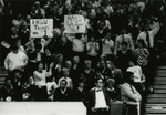Crowd Holds Signs by Fort Hays State University Athletics
