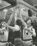 Doug Befort and Mike Pauls Reach for the Ball by Fort Hays State University Athletics
