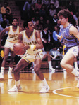 Reggie Smith Attempts to Evade Guard by Fort Hays State University Athletics