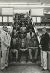 1985-1986 Basketball Team Sitting on Stairs by Fort Hays State University Athletics
