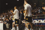 NCAA Elite Eight Game Players on the Sideline