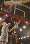 Players Taking Down Net by Fort Hays State University Athletics