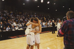 Two Players Hug after Win
