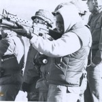 Close-up of ROTC Member Firing Large Caliber Firearm