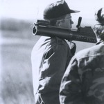 ROTC Member Shouldering a Large Firearm