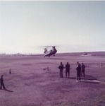 ROTC Members on Airfield Watching a Chinook Helicopter Take Off