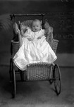 Box 2, Neg. No. 385: Baby in a Christening Gown in a Stroller
