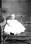 Box 2, Neg. No. 469: Baby on a Wicker Chair