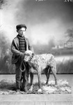 Box 4, Neg. No. 1092: Boy Standing with Dog