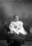 Box 4, Neg. No. 1041: Baby in a Chair