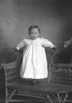 Box 8, Neg. No. 3091B: Baby on a Wicker Chair