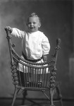 Box 9, Neg. No. 37044: Baby Standing on a Chair by William R. Gray
