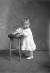 Box 12, Neg. No. 6582-2: Baby Standing at a Stool by William R. Gray