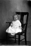 Box 12, Neg. No. 6569: Baby Sitting in a Chair by William R. Gray
