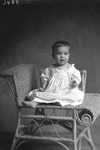 Box 15, Neg. No. 9842: Baby Sitting on a Chair
