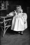 Box 17, Neg. No. 17003 - : Baby Standing by a Chair