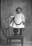 Box 18, Neg. No. 19003: Child Standing on a Chair