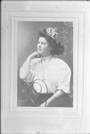 Box 18, Neg. No. 21073E: Framed Photograph of a Woman Sitting