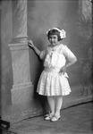Box 19, Neg. No. 26063: Girl Standing with a Hand on Her Hip