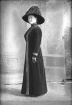Box 20, Neg. No. 27032: Woman Standing with a Hat