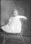 Box 20, Neg. No. 27095: Baby Sitting in a Chair