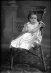 Box 20, Neg. No. 29052: Baby Sitting in a Chair