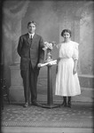 Box 21, Neg. No. 29074: Roy George and an unidentified girl
