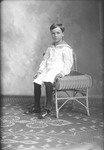 Box 21, Neg. No. 30277: Boy Sitting on a Chair