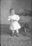 Box 21, Neg. No. 30263: Baby Standing by a Chair